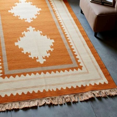 Hand Knotted Orange And Southwestern Wool Rug